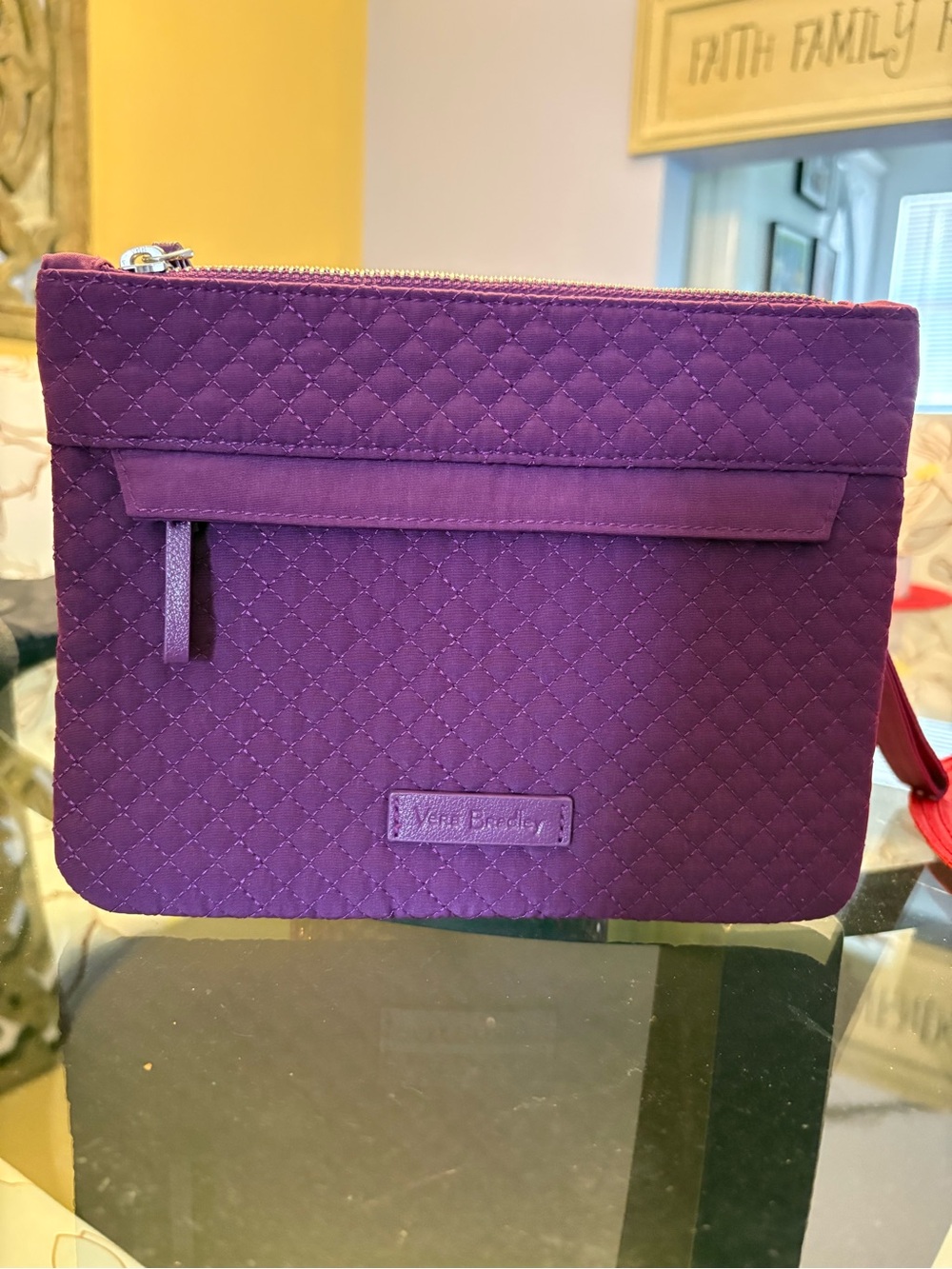 Vera Bradley Deep Purple Quilted Wristlet Clutch. This clutch is 8 1/2” W and 6”